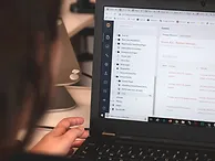 person using black laptop computer_edite